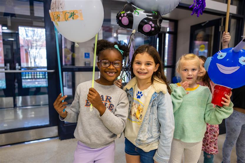 Students in a balloon parade